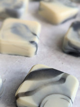 Load image into Gallery viewer, BEAM natural body care natural soaps. Half size black and white awaken soaps.
